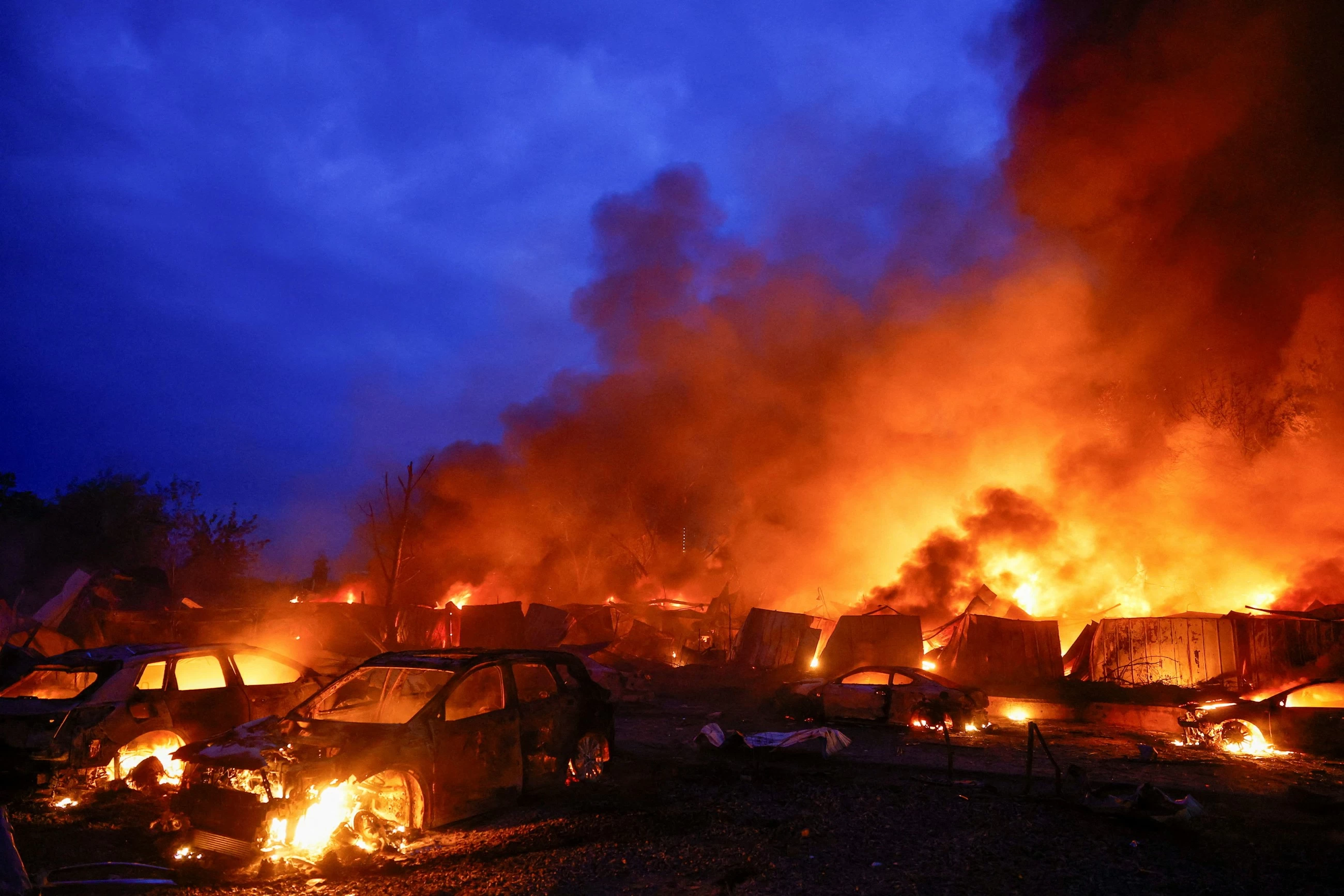 Russian missile and drone attack on Ukraine's capital kills 14