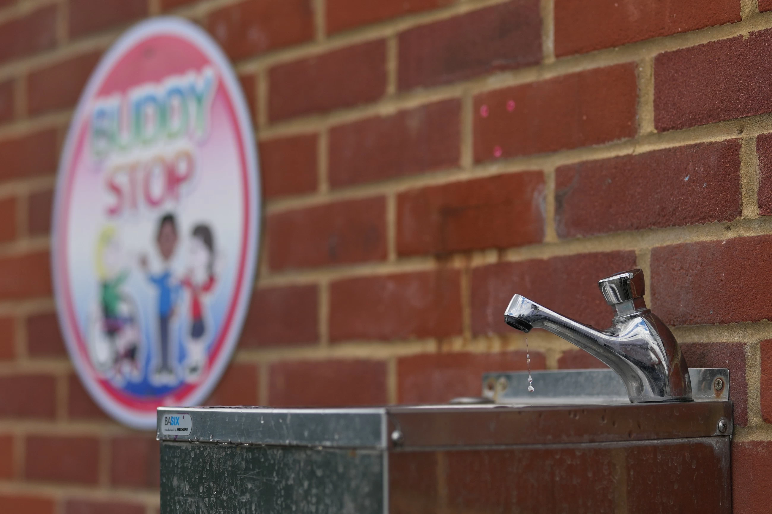 With poor ventilation and children packed in, UK's outdated schoolhouses swelter in the heat