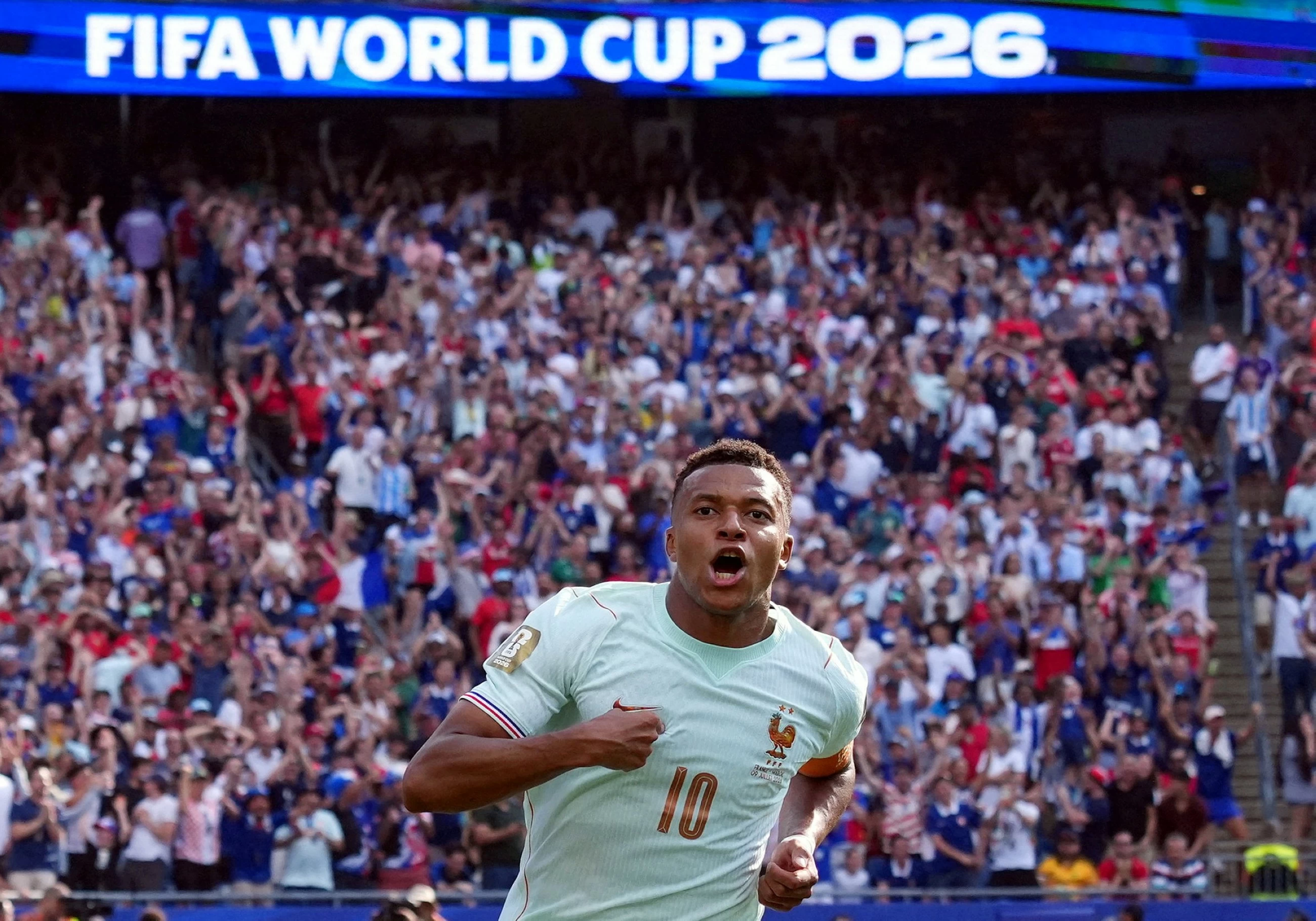 Mbappé scores his 8th World Cup goal before leaving game with a 'slight' ankle injury