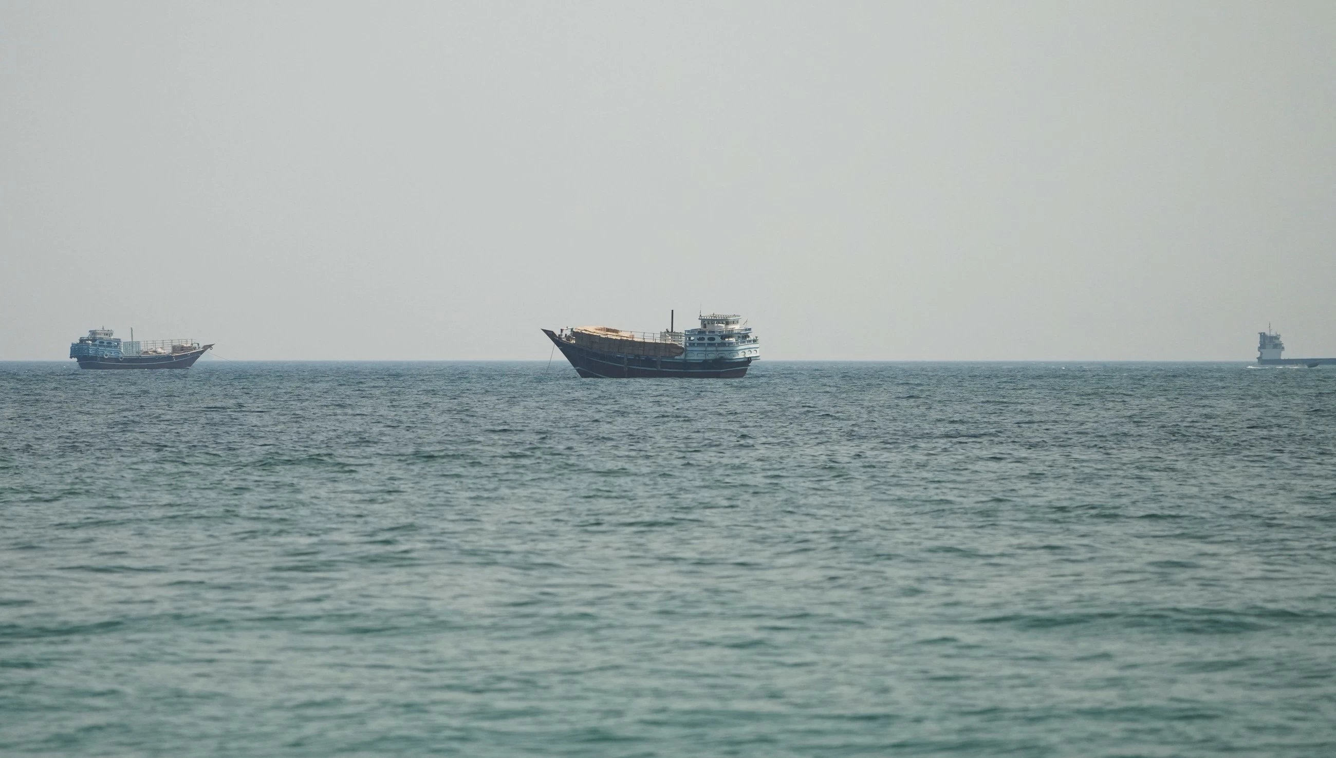 Trump says Strait of Hormuz open to commercial traffic even as US, Iran trade attacks