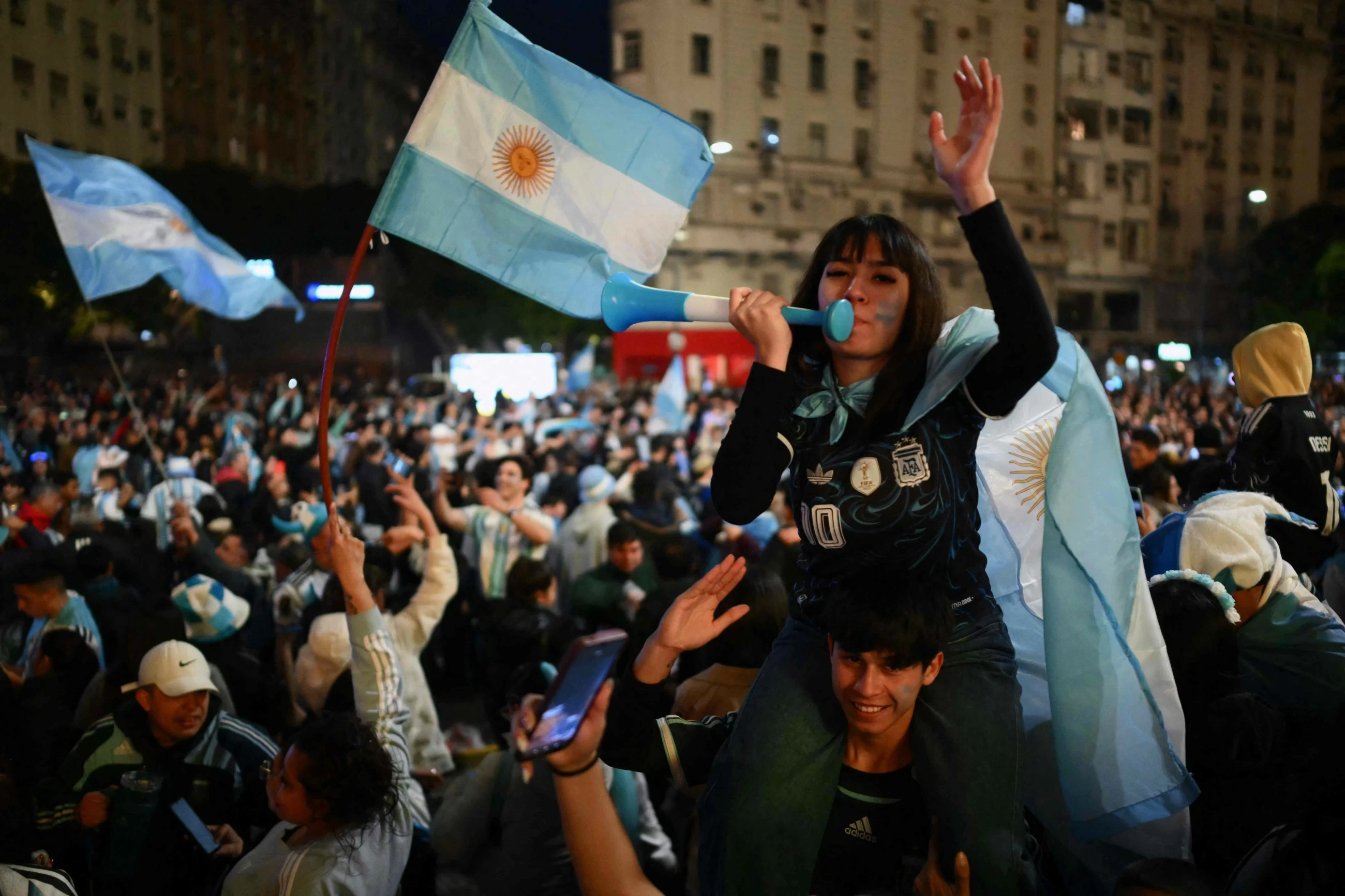 Tens of thousands of Argentine soccer fans celebrate their team's World Cup semifinal victory