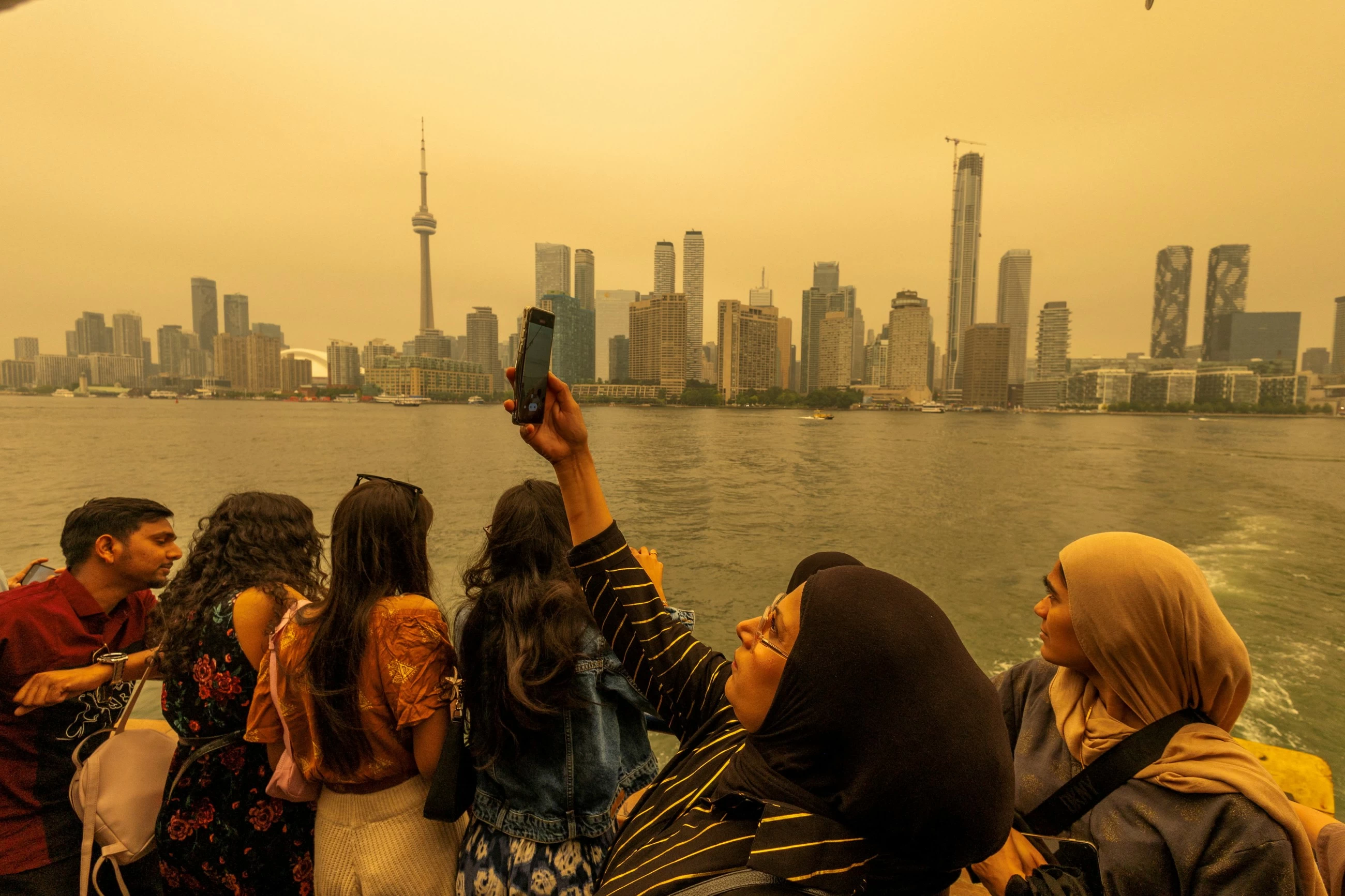 Hazardous wildfire smoke chokes millions in US and Canada
