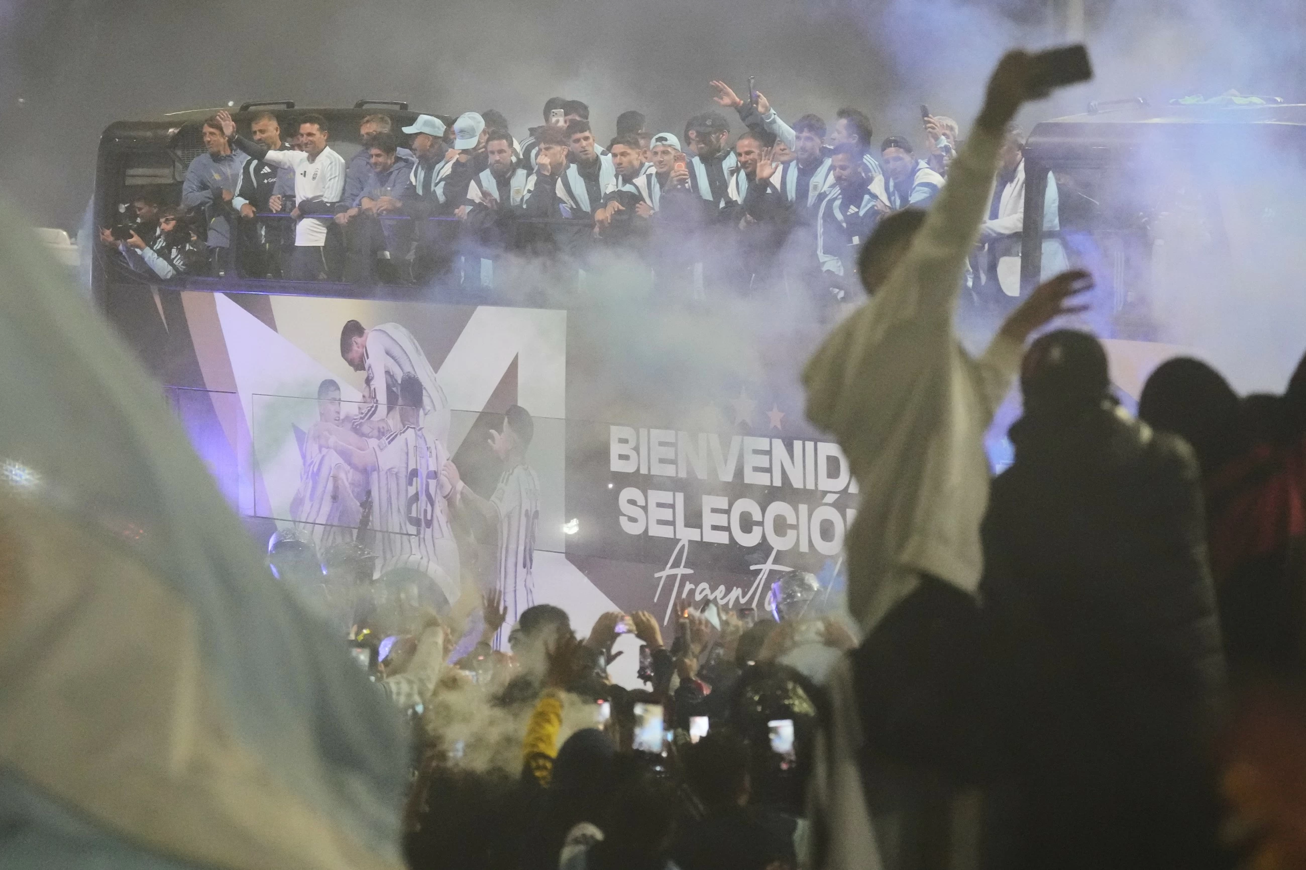 Thousands welcome home Argentina squad, without Messi, despite World Cup loss
