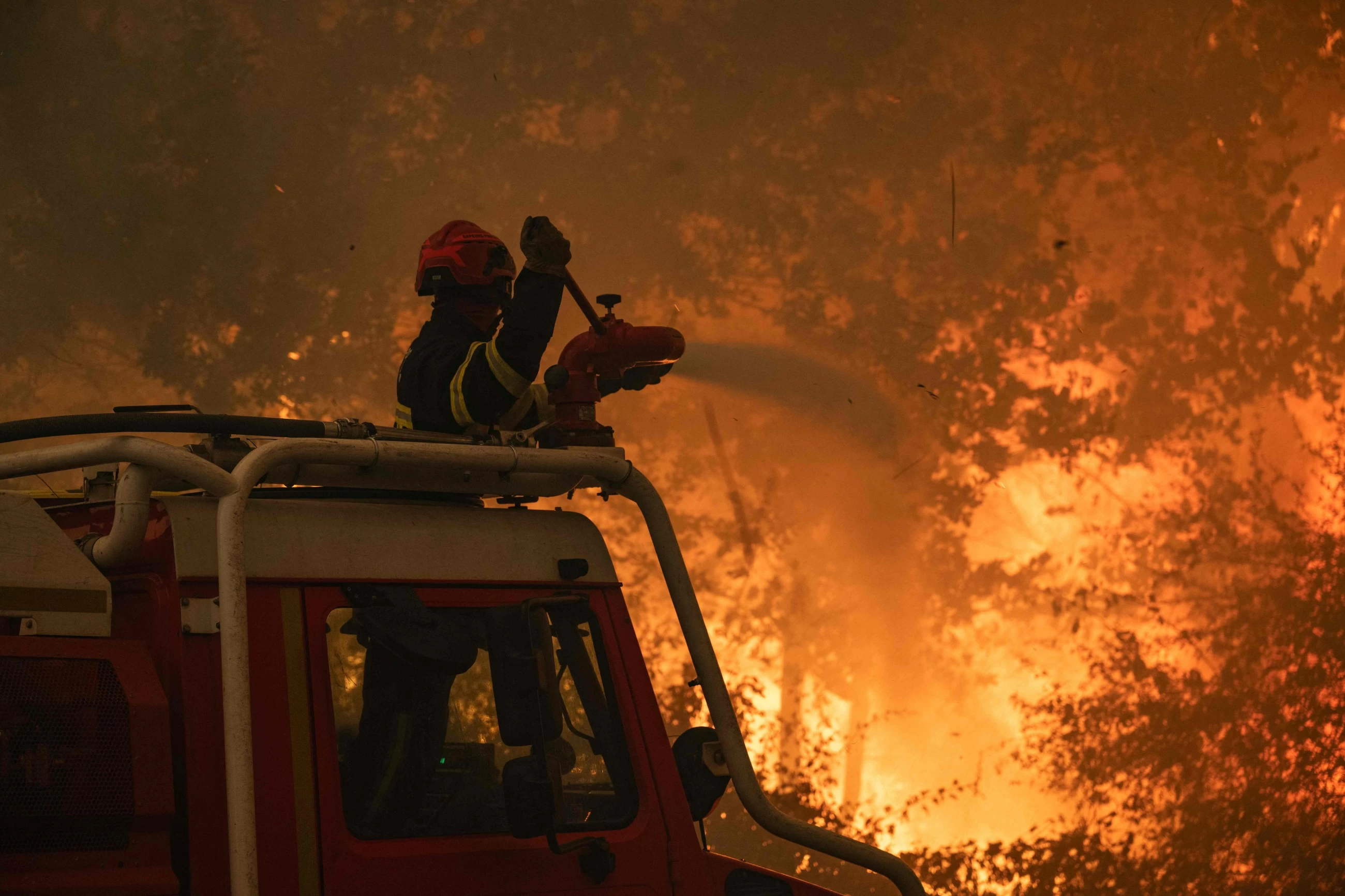 Over 300,000 forced to flee as wildfires scorch France, Spain