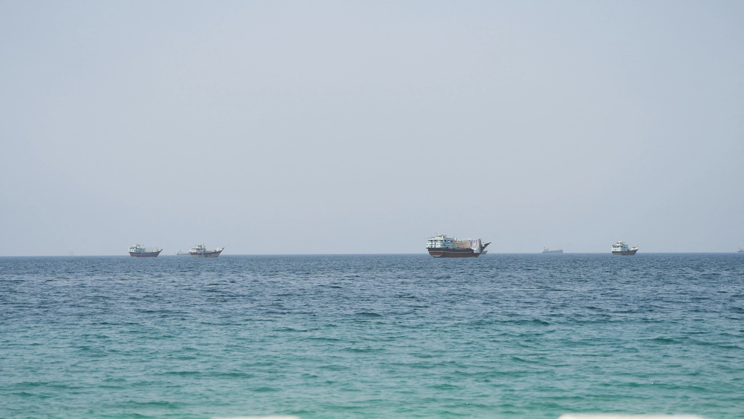 Oman says Hormuz talks 'positive,' condemns ship attacks