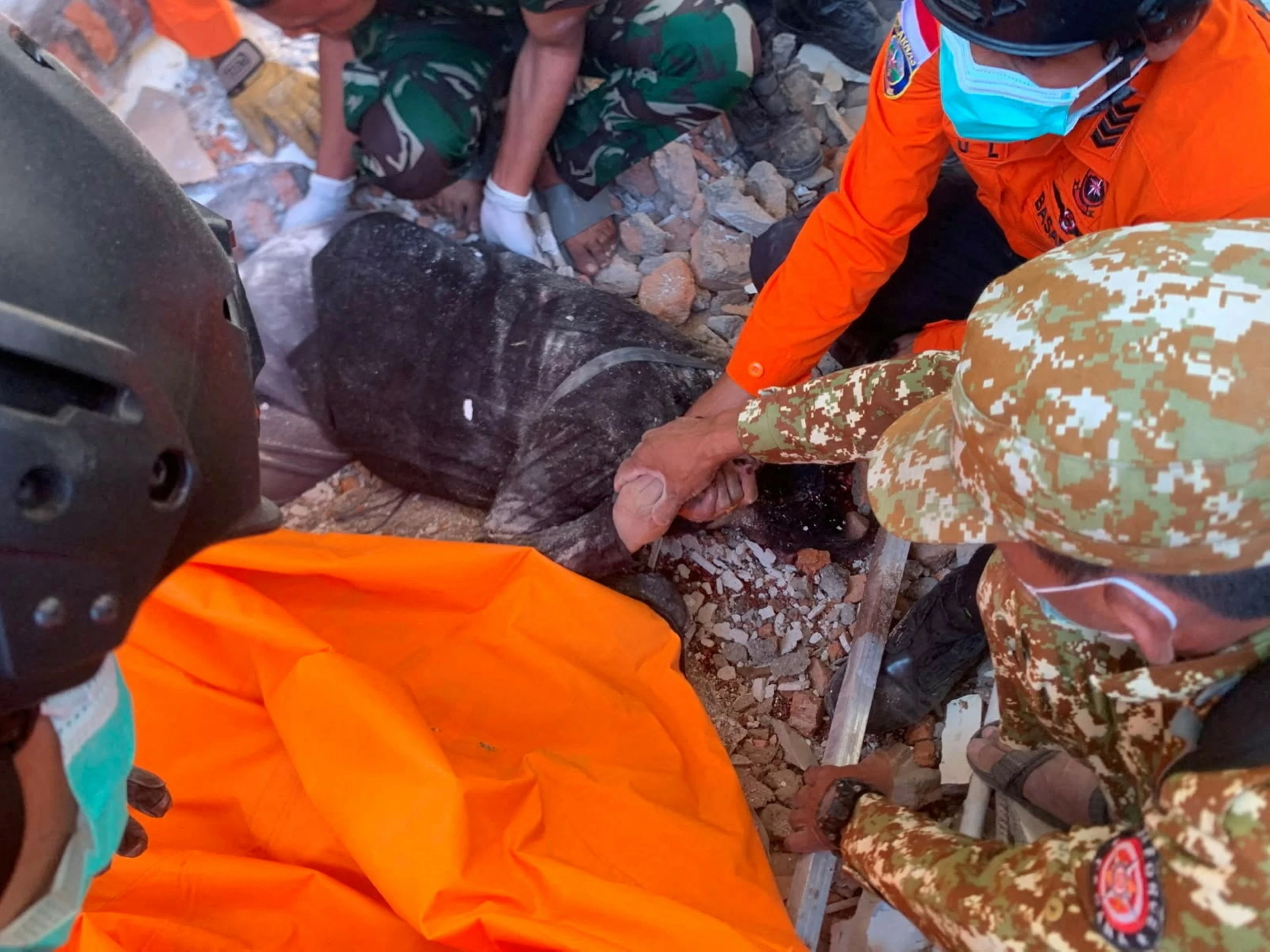 At least 38 dead after Indonesia's magnitude-7.7 earthquake