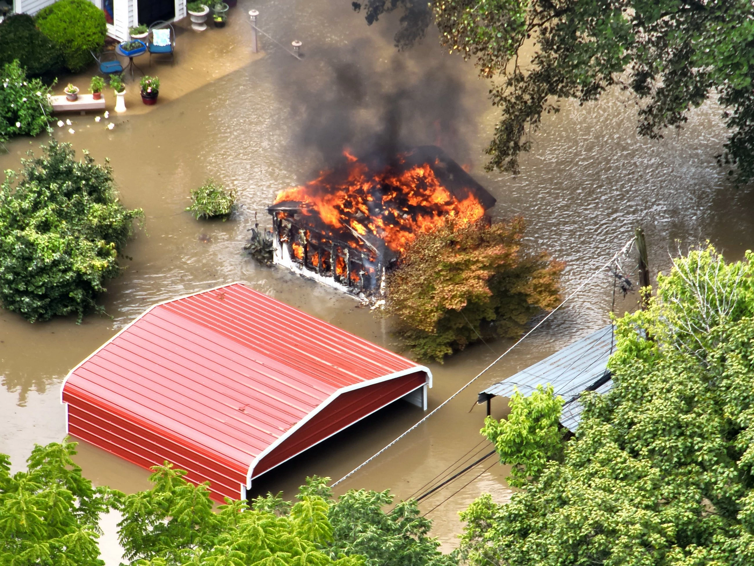 At least 6 dead as record-setting flooding inundates US state of Indiana