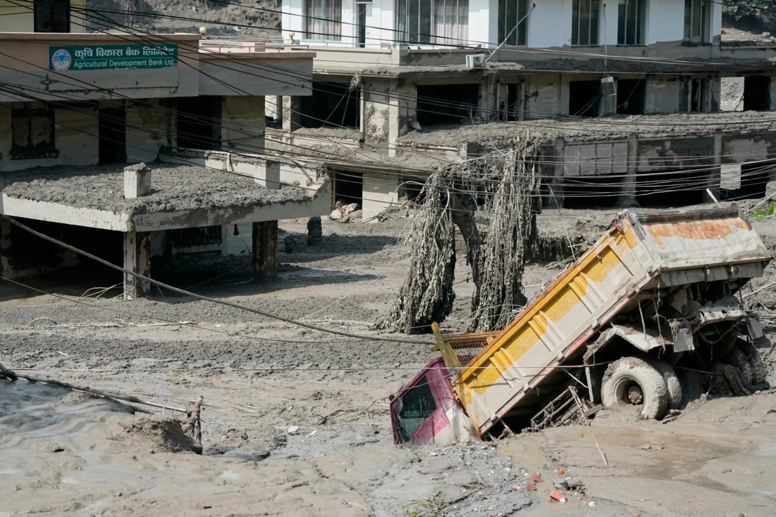 Flash flood on Nepal-Tibet border kills nine; toll likely to jump
