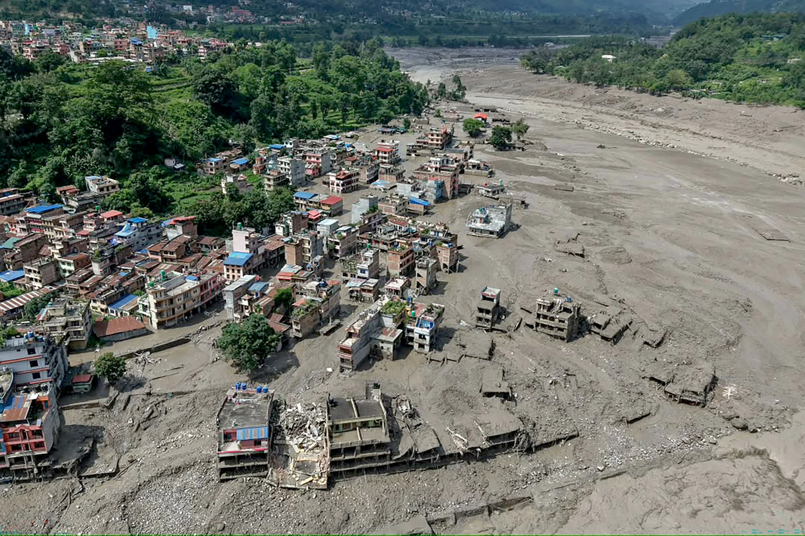 Flash flood on Nepal-Tibet border kills nine; toll likely to jump