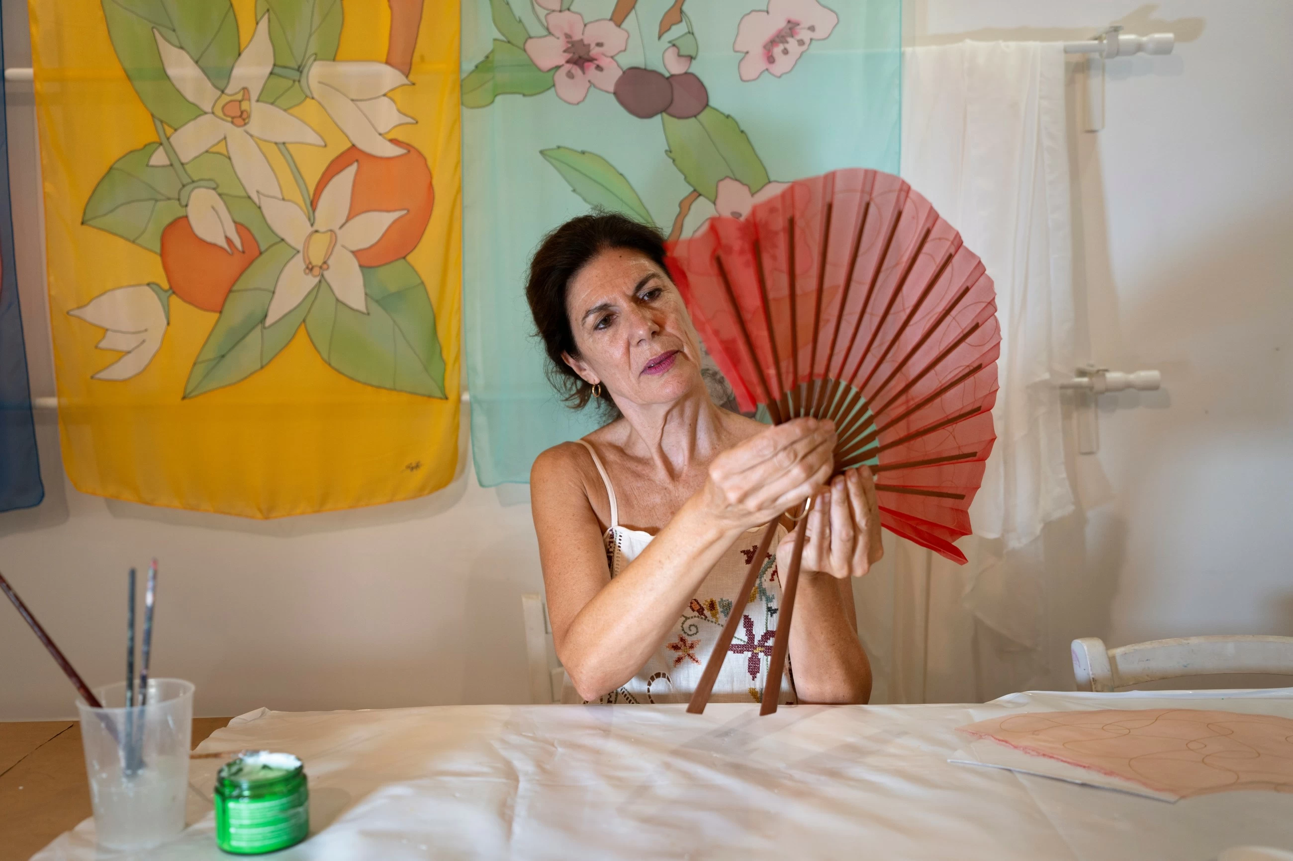 In a scorching Spain, the traditional folding hand fan is having a moment