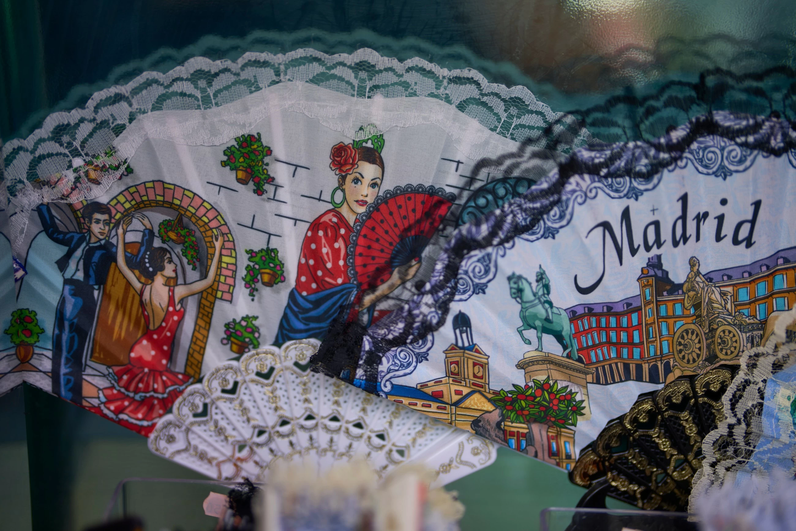 In a scorching Spain, the traditional folding hand fan is having a moment
