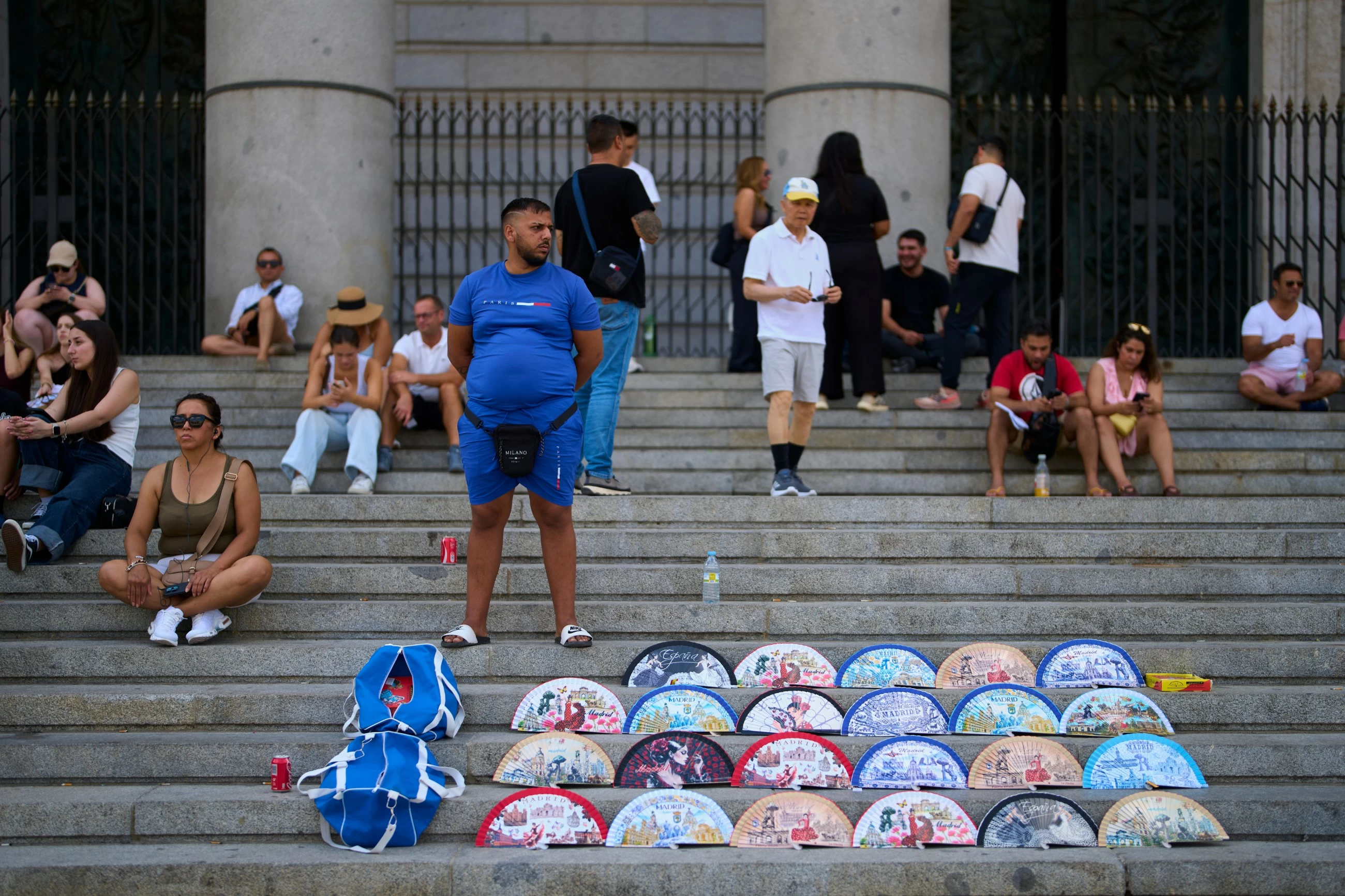 In a scorching Spain, the traditional folding hand fan is having a moment