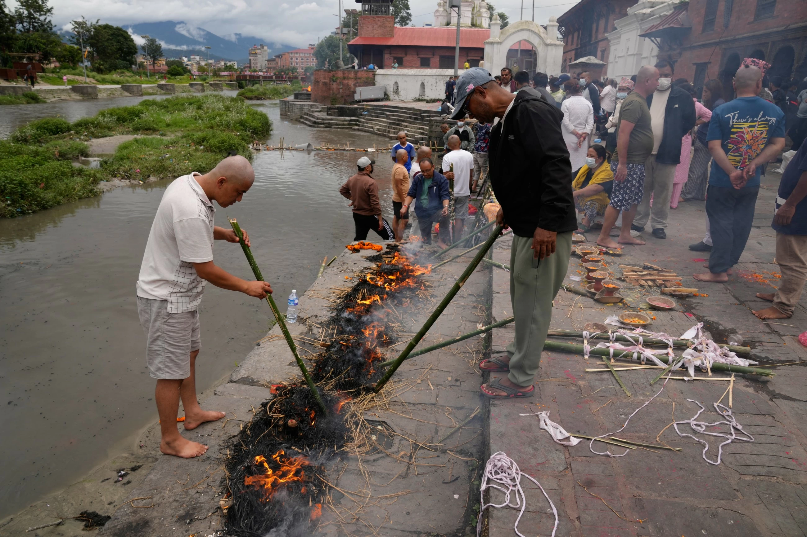 Nepal flood survivors cling to zipline to cross treacherous river