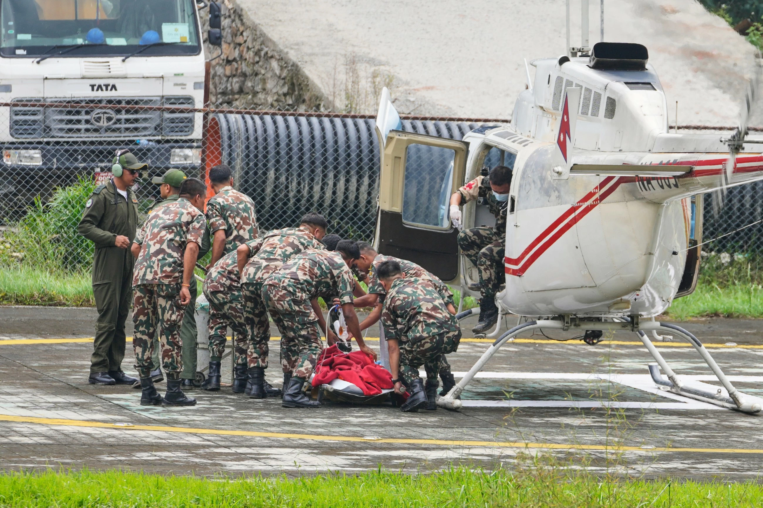 2 trapped workers rescued from hydropower tunnel 9 days after Nepal floods