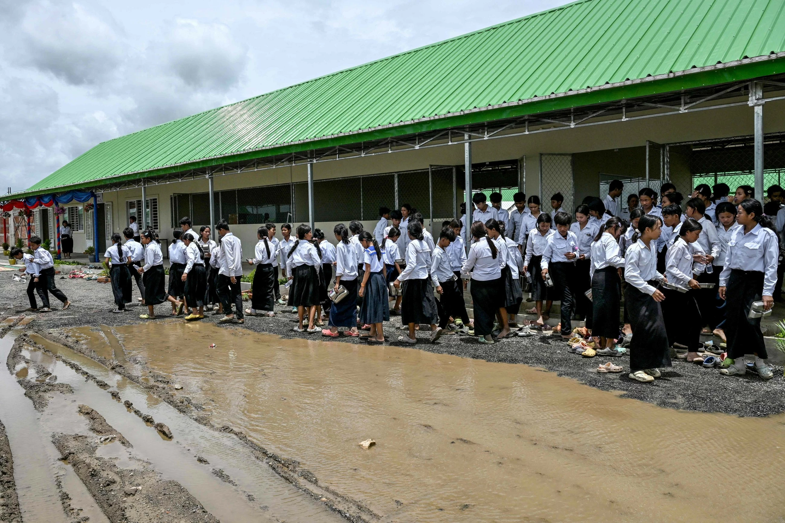 'I miss my home:' Cambodians displaced by conflict start over in 'waiting village'