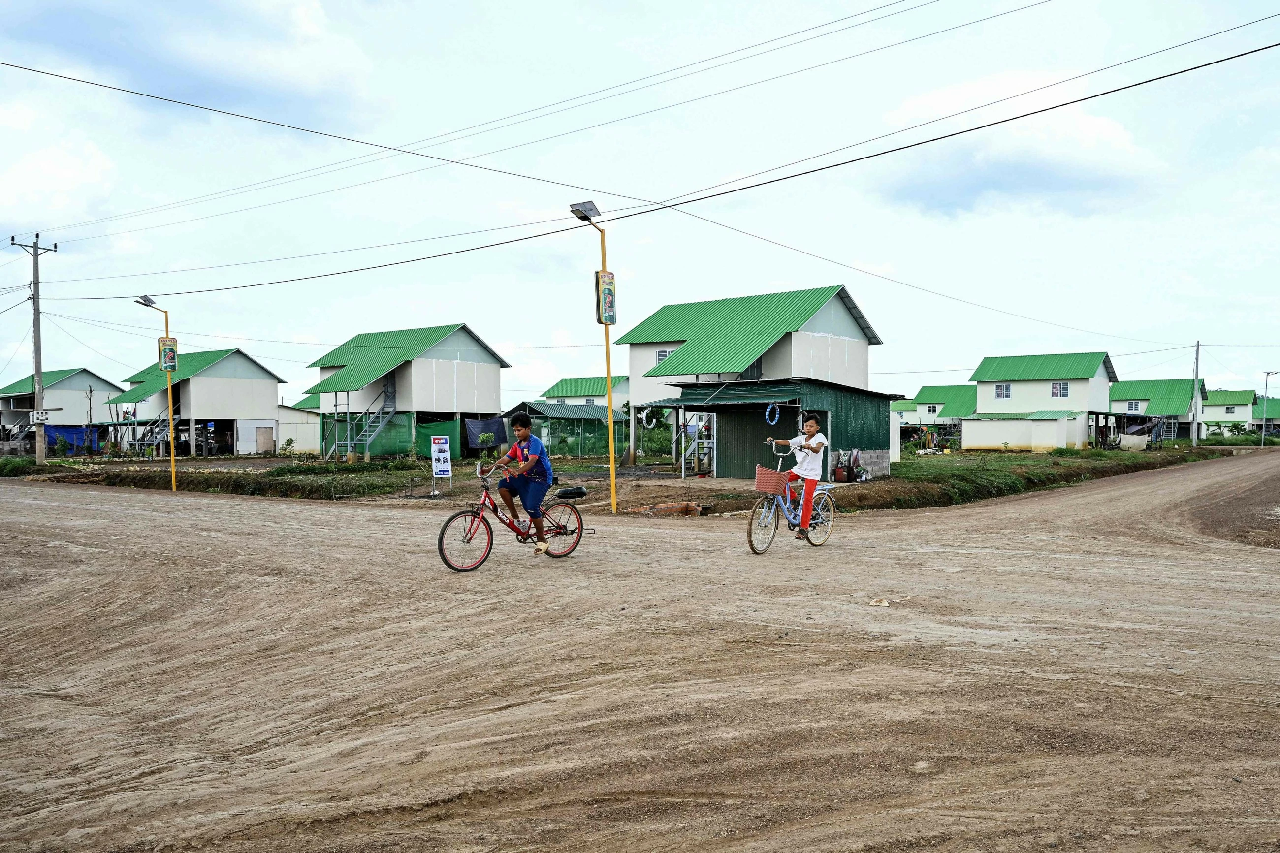 'I miss my home:' Cambodians displaced by conflict start over in 'waiting village'
