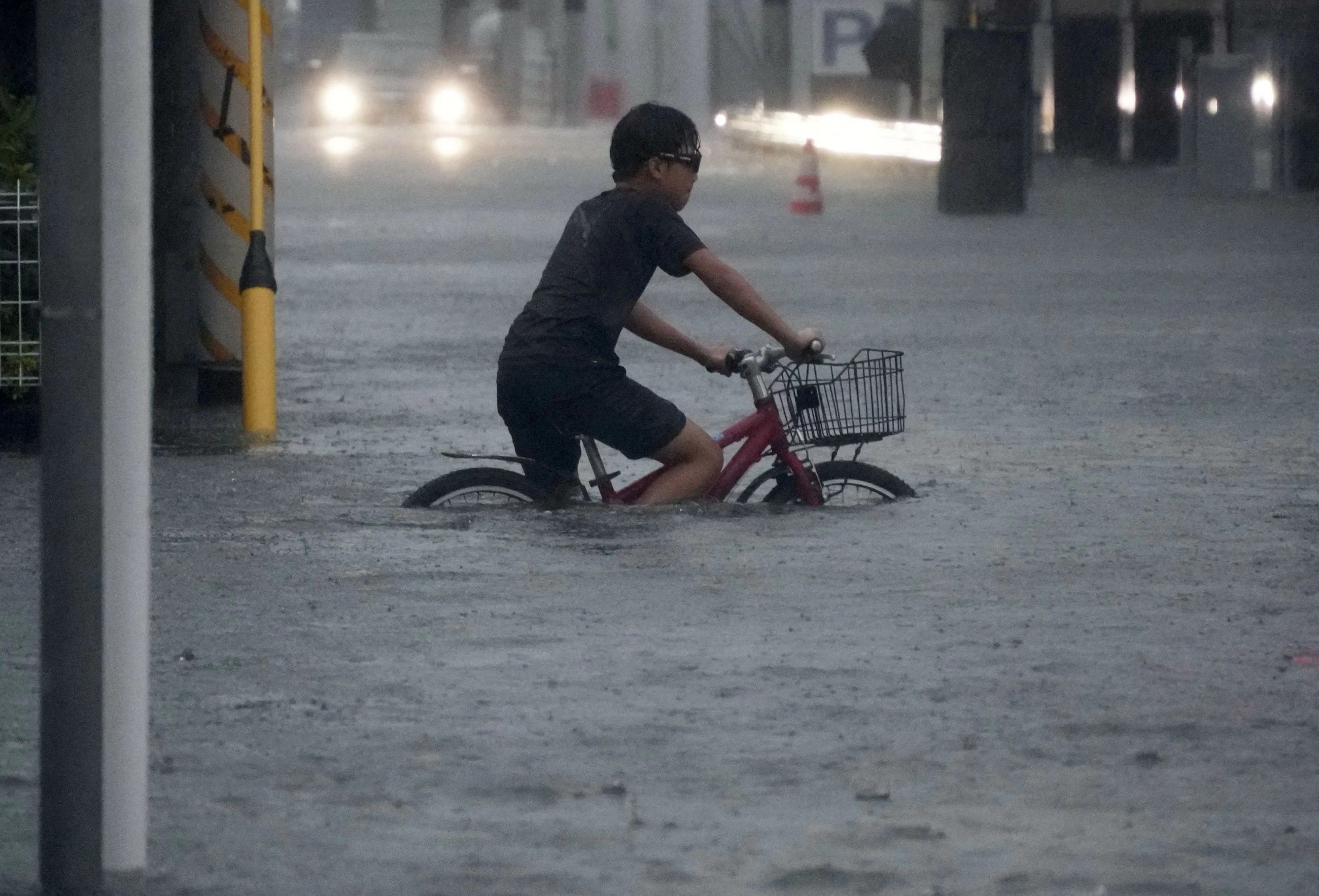 Hundreds of flights cancelled, millions told to evacuate as Typhoon Dujuan nears Japan