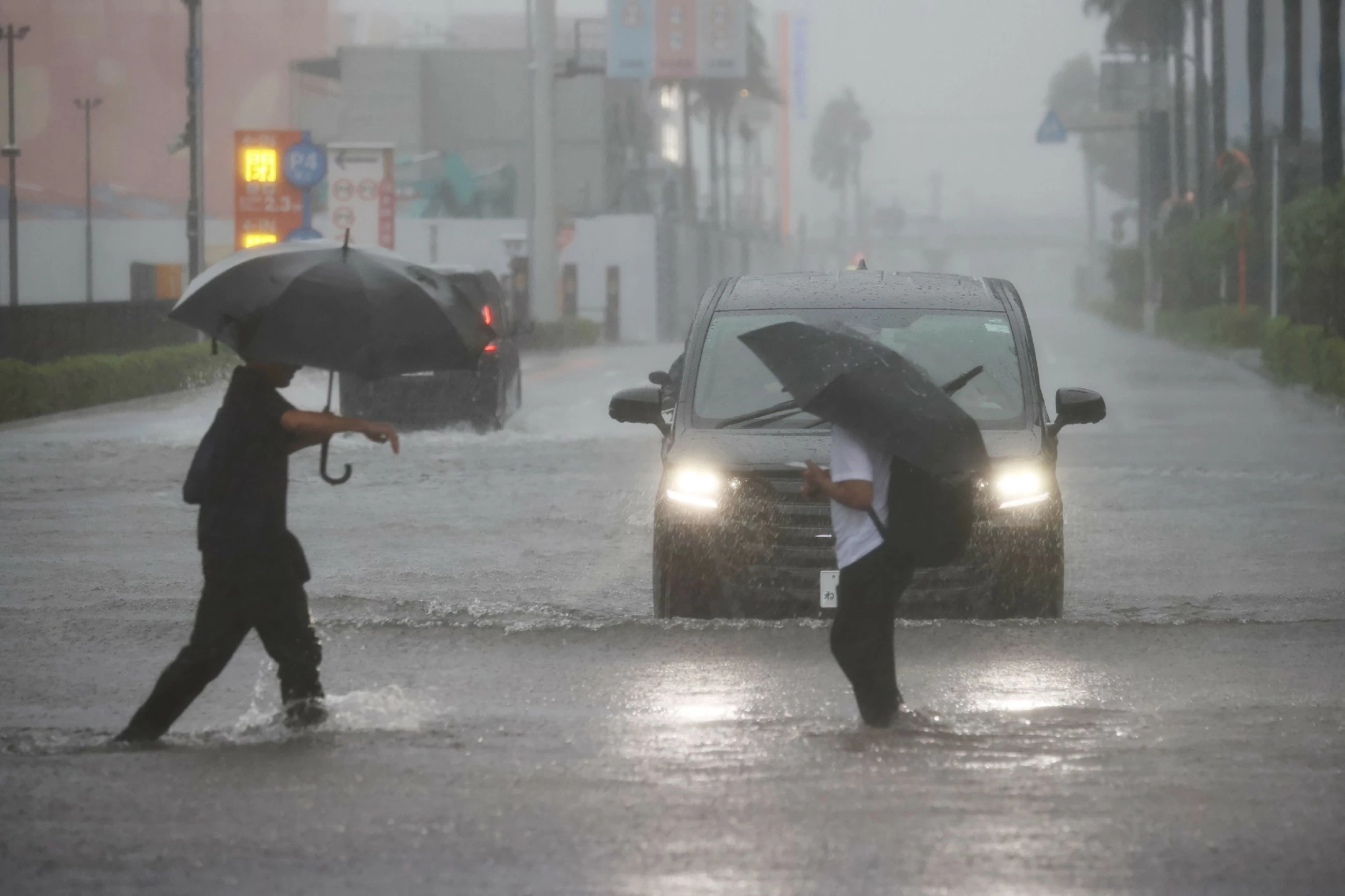 Hundreds of flights cancelled, millions told to evacuate as Typhoon Dujuan nears Japan