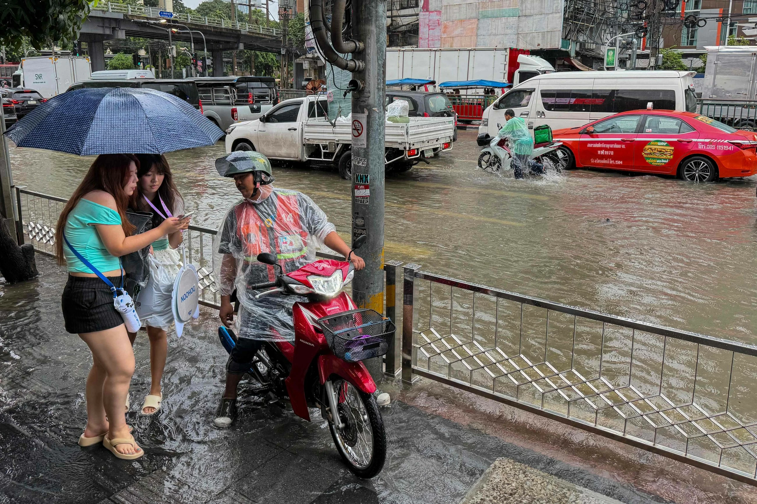 Canals full, roads submerged as Bangkok declares flood disaster across all 50 districts