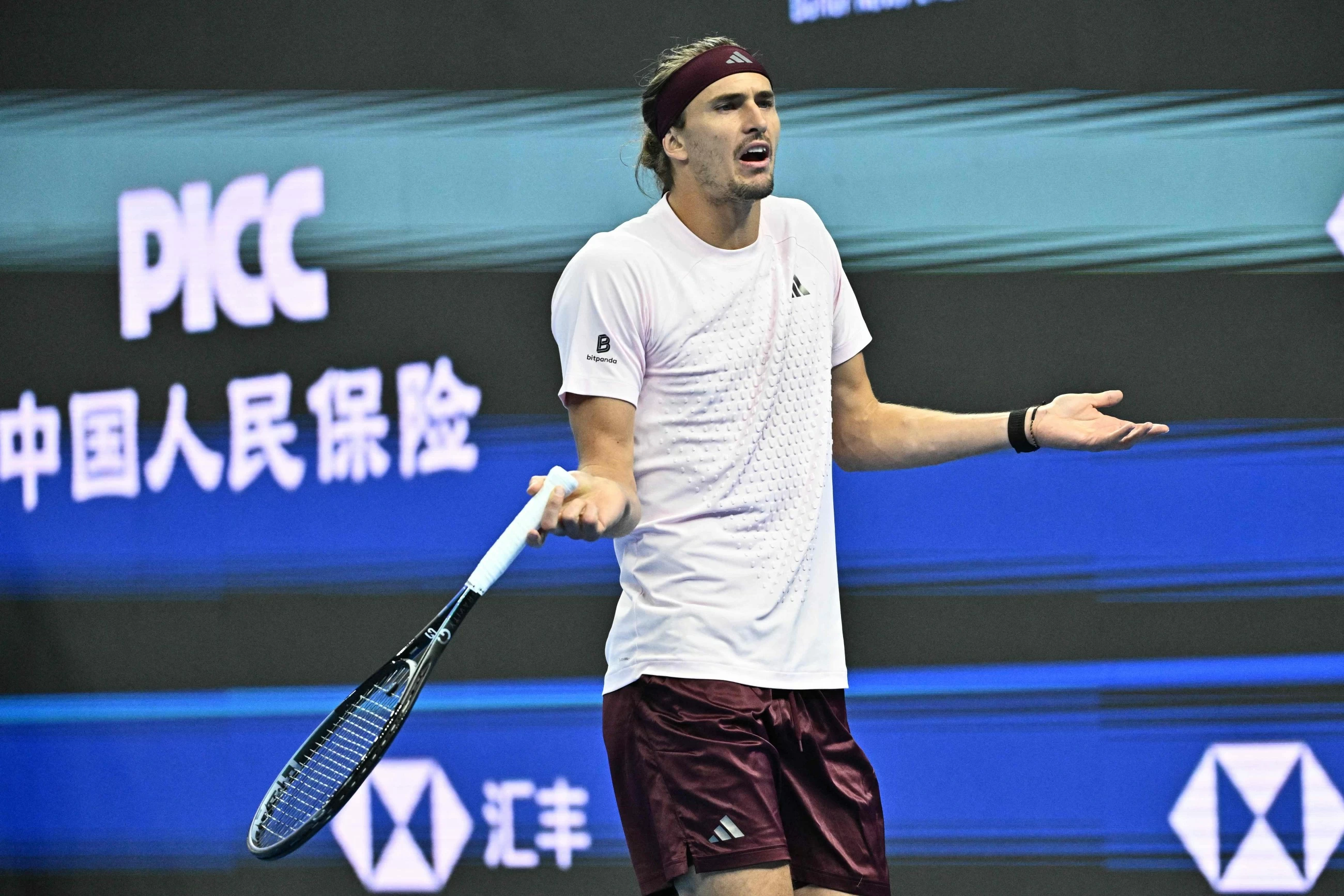 Battling Djokovic stuns top seed Zverev at China Open