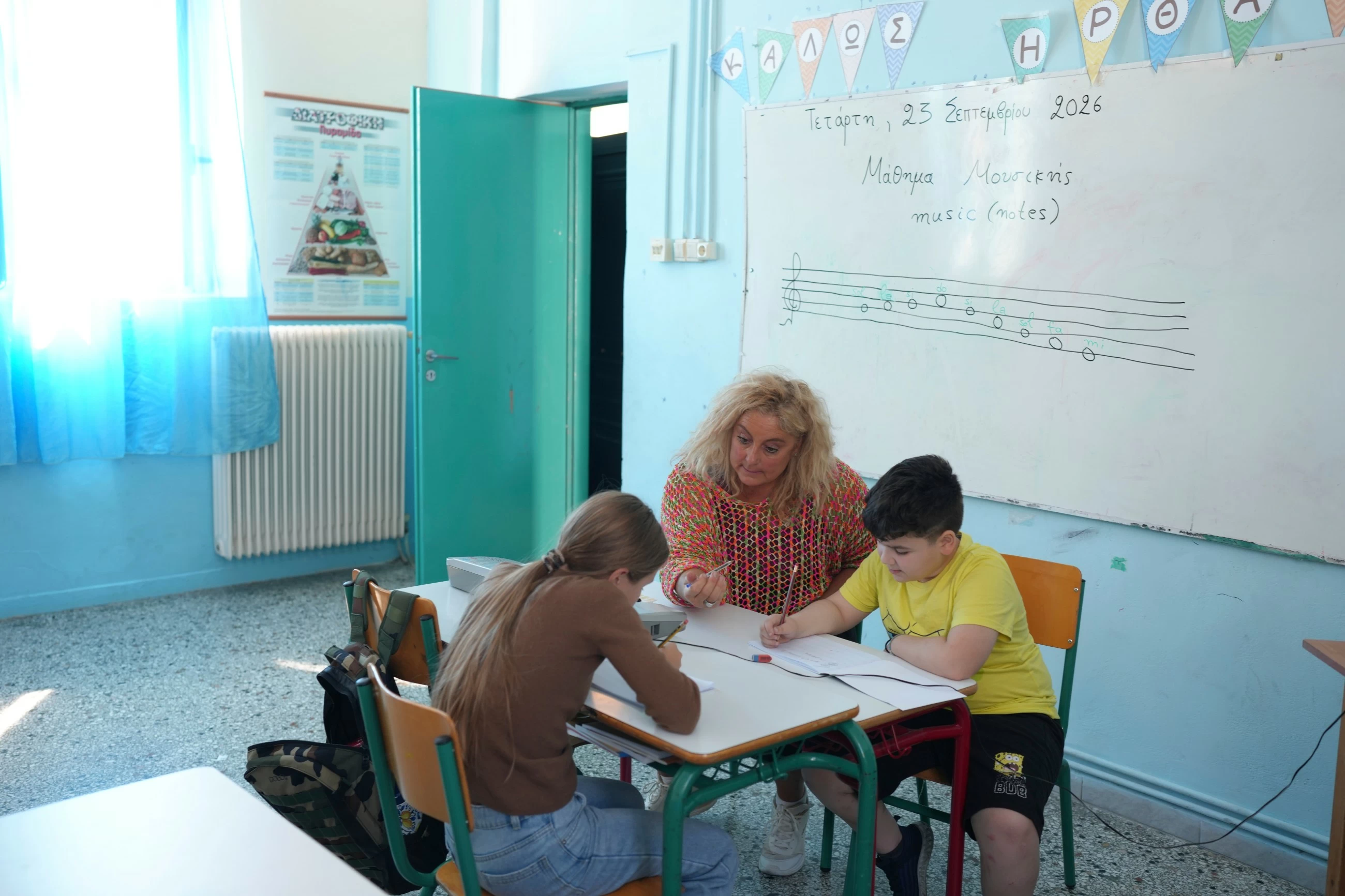 Children in Greece's Kalamos island go by boat to reach school